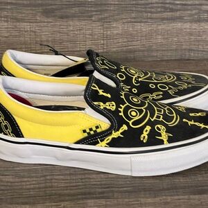 Vans Black and Yellow Slip-On Sneakers